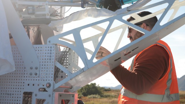 Erik Grant, a rigging lead at Raven Aerostar, conducts high altitude balloon (HAB) pre-launch checks during the Thunder Cloud live-fire exercise in Andoya, Norway, Sept 15, 2021. Raven Aerostar facilitated the coordination of long-range precision...