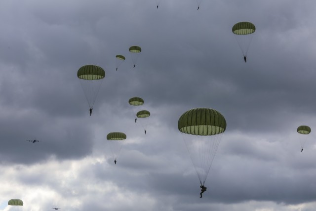Participants from 12 NATO allied forces and local citizens paid homage to the 77th Anniversary of Operation Market Garden by gathering at a series of drop zones across the Netherlands and Belgium to observe one thousand Soldiers parachuting from...