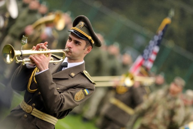 A trumpet player for the military orchestra of Hetman Petro Sagaidachny National Academy of Land Forces performs in front of a formation of multinational forces during the opening ceremony for Rapid Trident 21, an annual Ukrainian-American training exercise, Sept. 20, at Central City Stadium, near Yavoriv, Ukraine. Rapid Trident has been conducted since 2006 under the &#34;Partnership for Peace&#34; program with the participation of NATO servicemembers. The purpose is to prepare for joint actions as part of a multinational force during coalition operations. 