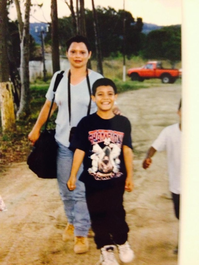 Staff Sgt. Henry Meza, an Iowa Army National Guard Soldier who works with the Service to Citizenship program, smiles for a photo with his mother in Honduras. Meza moved to the U.S. with his mother at age 12 and became a U.S. citizen in 2013. He...