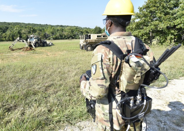 Staff Sgt. Rashad Hailey, a horizontal construction engineer from the 41st Clearance Company at Fort Riley, Kansas, assesses the capabilities of the Route Clearance and Interrogation System, or RCIS, which is a retrofitted system for Army Engineer...