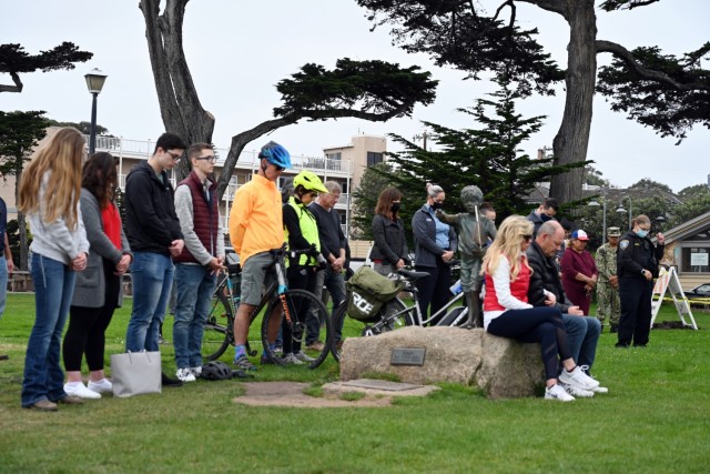 Members of the public pray at Lovers Point Park, Pacific Grove, Calif., Sept. 17, during the “Afghanistan Servicemembers Memorial” for the 13 service members killed in action at the Kabul Airport on Aug. 26.