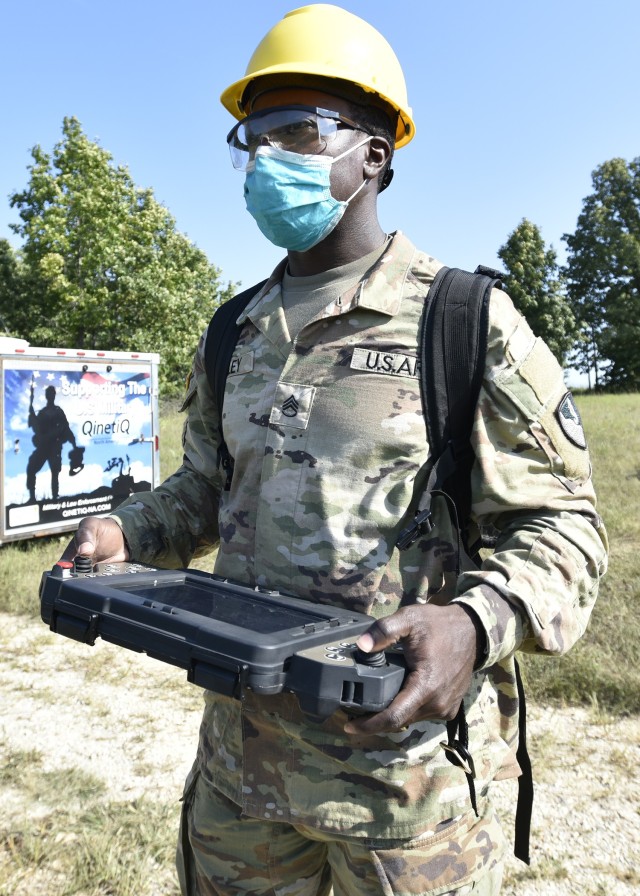 Staff Sgt. Rashad Hailey, a horizontal construction engineer from the 41st Clearance Company at Fort Riley, Kansas, assesses the capabilities of the Route Clearance and Interrogation System, or RCIS, which is a retrofitted system for Army Engineer vehicles that provides remote control functionality and a video interface via multiple camera mountings. The assessment, which took place Sept. 16 at Training Area 401, was part of the annual Maneuver Support, Sustainment and Protection Integration Experiments, or MSSPIX. The event provides military sponsors with an opportunity to put the latest tools in the hands of Soldiers while also giving capability developers and the science and technology community credible and validated operational experiment venues for their conceptual and materiel development.