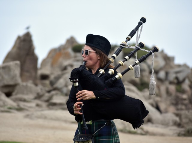 Kasie Talbot plays the bagpipes at Lovers Point Park, Pacific Grove, Calif., Sept. 17, before the “Afghanistan Servicemembers Memorial” for the 13 service members killed in action at the Kabul Airport on Aug. 26.