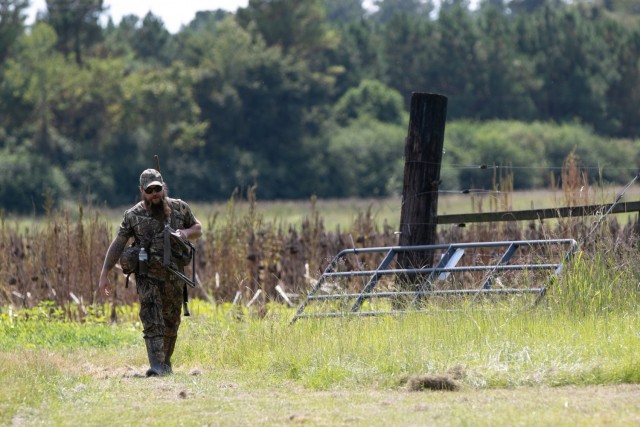 A hunter returns from the dove fields following a successful outing during the 7th annual Warriors Dove Hunt at the Cooper River Rediversion Project in St. Stephen, SC. The hunt is exclusively for U.S. military Wounded Warriors and veterans and is...