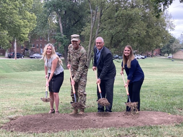 From left to right, Kolby Stobbe, regional vice president of property operations at Corvias; Col. Will McKannay, Fort Riley Garrison Commander; Charles Lincoln, United States Postal Service Fort Riley postmaster; and Belinda Mills, USPS Fort Riley...