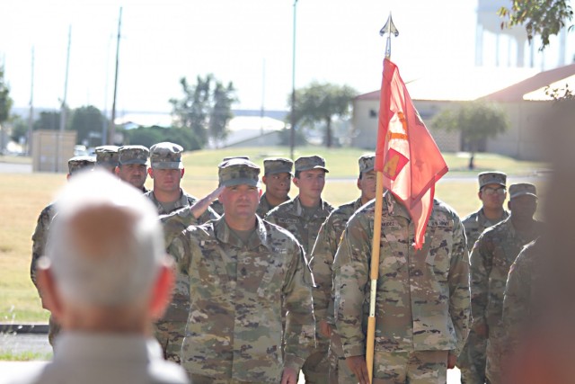 1st Sgt. Casey McCrady, A Battery&#39;s new first sergeant, salutes Capt. Catherine Grizzle at the conclusion of the change of responsibility ceremony Sept. 22, 2021, at Fort Sill, Oklahoma.