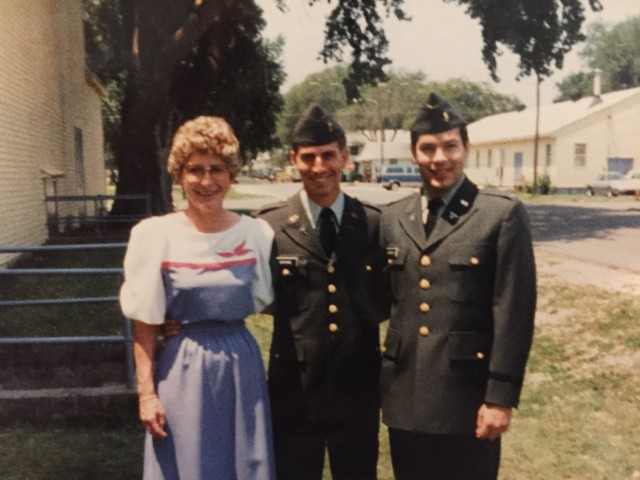 Second Lt. Richard Hopkins (center), now a colonel and the COVID-19 response coordinator with Weed Army Community Hospital, poses for a photo with his mother, Elsie (left) and 2nd Lt. David Suhrbier the day of Hopkins’ commissioning into the...