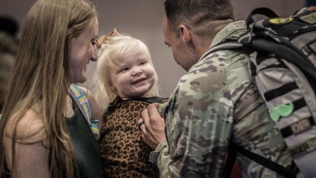 A Soldier returns from deployment and reunites with his family at Fort Hood, Texas, Sept. 22, 2021. 
