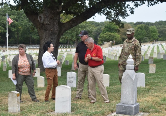 From left to right, Renea Yates, Director of the Office of Army Cemeteries, and Karen Durham-Aguilera, Executive Director of the Office of Army Cemeteries, tour the post cemetery with Kevin Griffin, Fort Riley Post Cemetery Supervisor, Jeffrey...