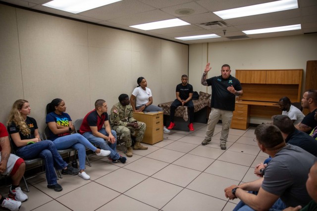 U.S. Army Staff Sgt. Jeff Pearlstein, a Victim Advocate from 89th Military Police Brigade, answers questions during a Supporting Warrior Action Team, SWAT, training session after a vignette scene is performed by Soldiers the from the 1st Cavalry Division, and 29th Infantry Division, at the People First Center building, Fort Hood, Texas, June 25, 2021. SWAT is a program that teaches junior enlisted how to spot predatory behavior amongst their ranks, including sexual harassment, sexual assault, equal opportunity, and suicide. (U.S. Army photo by Sgt. Brian D. Jones)