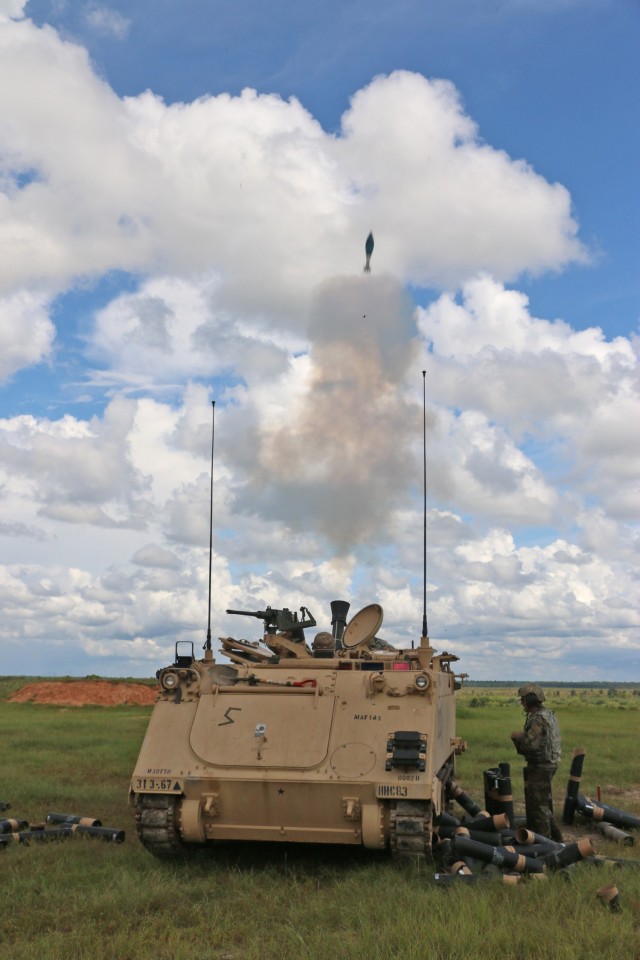 Soldiers assigned to the mortar section of 3rd Battalion, 67th Armored Regiment, 2nd Armored Brigade Combat Team, 3rd Infantry Division, fire a volley of 120mm rounds toward a target at OP4 on Fort Stewart, Georgia, Sept. 15, 2021.The mortar section in the headquarters and headquarters company must go through the mortar evaluation program, or MORTEP, in order to become certified on their weapon system for effective indirect fires in combat operations. (U.S. Army photo by Staff Sgt. Todd L. Pouliot, 50th Public Affairs Detachment)