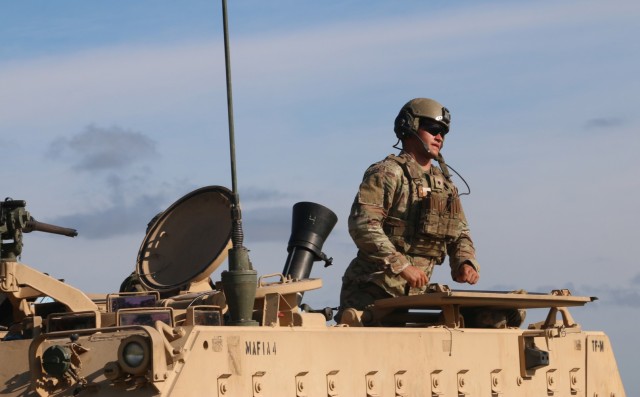 A Soldier assigned to the mortar section of 3rd Battalion, 67th Armored Regiment, 2nd Armored Brigade Combat Team, 3rd Infantry Division, asks for a count of remaining 120mm rounds at OP4 on Fort Stewart, Georgia, Sept. 15, 2021. The mortar...