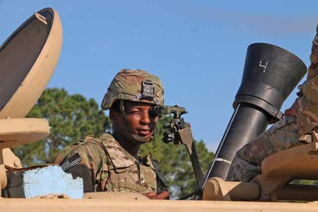 A Soldier assigned to the mortar section of 3rd Battalion, 67th Armored Regiment, 2nd Armored Brigade Combat Team, 3rd Infantry Division, checks the sites of his squad’s 120mm mortar at OP4 on Fort Stewart, Georgia, Sept. 15, 2021. The mortar...