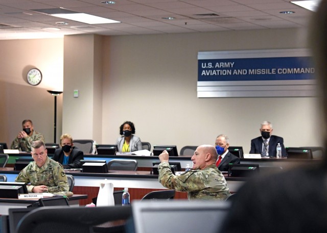 Army Material Commander Gen. Ed Daly (right) discusses the importance of balance when it comes to tactical and strategic readiness during the U.S. Army Aviation and Missile Command triannual update, held Sept. 20 at Redstone Arsenal, Ala.