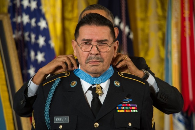 Sergeant Santiago J. Erevia receives the Medal of Honor March 18, 2014, from President Barack Obama at the White House. Erevia received the Medal of Honor for his heroic actions during the Vietnam War. Obama presented 24 Medals of Honor in a rare ceremony meant to commemorate acts of bravery that the government concluded should of been recognized long ago.