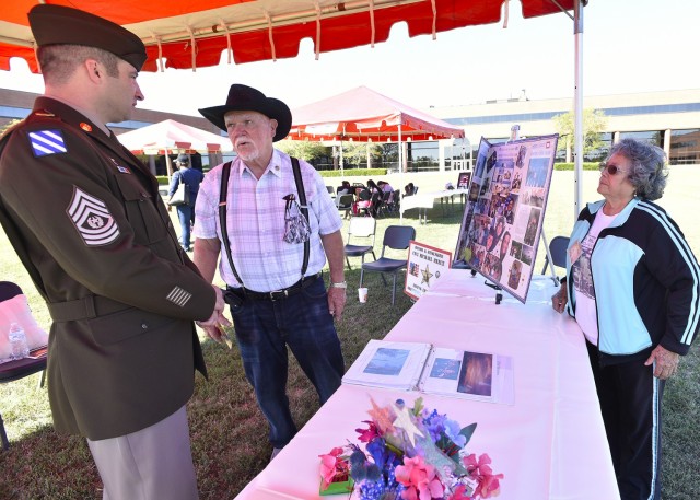 The parents of Chief Warrant Officer 3 Michael Reece – who was killed when his helicopter crashed during a training exercise in Poland, in 2001 – speak with U.S. Army Garrison Fort Leonard Wood Command Sgt. Maj. Sean McGlensey at a Gold Star...
