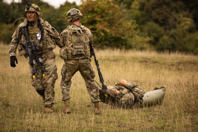 U.S. Army Soldiers assigned to Alpha Company, 1st Battalion, 16th Infantry Regiment “Iron Rangers,” 1st Armored Brigade Combat Team, 1st Infantry Division, move a simulated casualty during a multinational situational training exercise in...