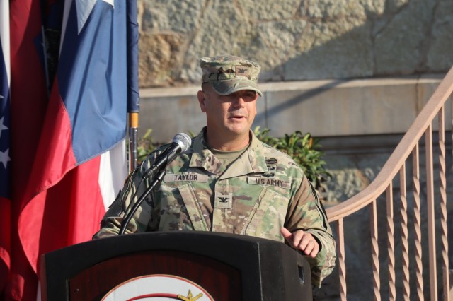 Fort Sill Garrison Commander Col. Rhett Taylor addresses the audience at the relinquishment of responsibility ceremony for Command Sgt. Maj. Russell Blackwell, Sept. 28, 2021, in front of the garrison headquarters. Taylor called Blackwell a...