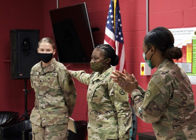 Col. Fenicia L. Jackson, the chief of staff for the 1st Theater Sustainment Command Operational Command Post, interacts with Spc. Ashlyn S. Jones, a Soldier assigned to the 3rd Infantry Division Sustainment Brigade, and Spc. Myeasha E. Berryman, a Soldier assigned to Area Support Group-Kuwait, during a Sexual Harassment/Assault Response and Prevention, or SHARP, ambassador program training session, Sept. 24, 2021, at Camp Arifjan, Kuwait. Jackson used audience participation to vote for the best SHARP slogan that will be printed on posters and displayed throughout the installation. The two-day course, hosted by the 1st TSC OCP, is designed to provide junior Soldiers with the education and skills necessary to promote a culture change within the Army.