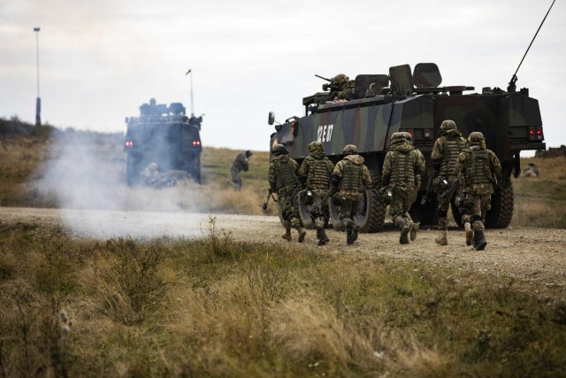 Romanian Soldiers assault a bunker during a multinational situational training exercise in Cincu, Romania, Sept. 23, 2021. This training was a part of multiple situational training exercises that U.S. Soldiers executed with multinational partners...