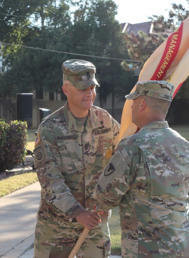 Passing the garrison colors to Fort Sill Garrison Commander Col. Rhett Taylor, Command Sgt. Maj. Russell Blackwell relinquishes his responsibilities during a ceremony Sept. 28, 2021, in front of Taylor Hall. Blackwell served here for nearly two...