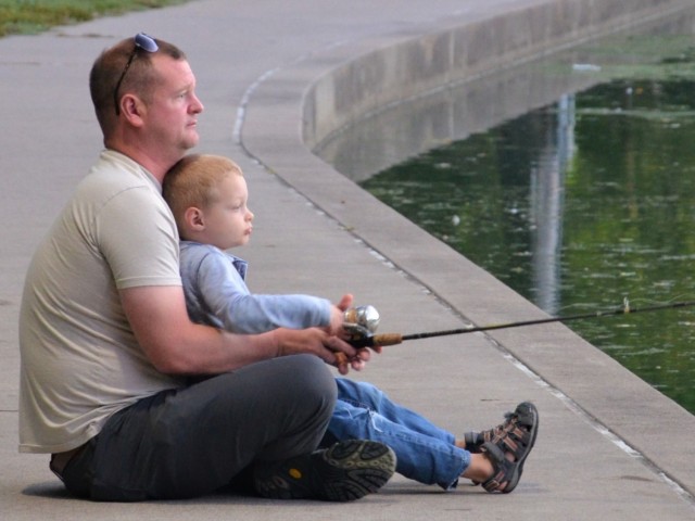 Anthony Patera and Axel, 4, enjoy a quiet, bonding moment at the Fatherhood Fishing Derby at Rock Island Arsenal, Illinois, Sept. 23.