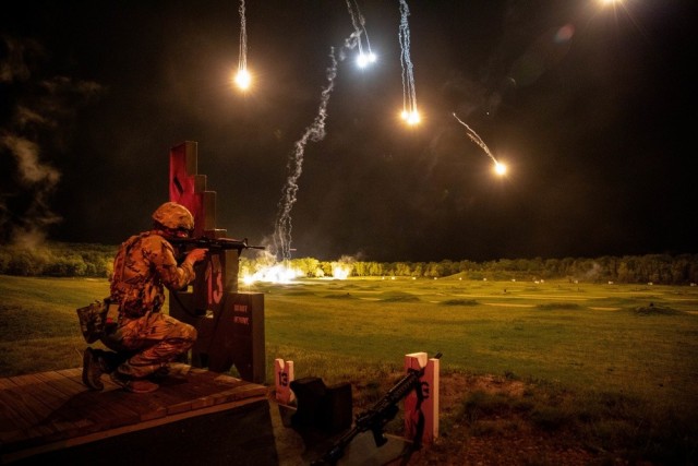 A Soldier engages targets at night during the 2021 Army Reserve Best Warrior Competition at Fort McCoy, Wis., May 25, 2021. Twenty-four finalists representing 12 Army commands will complete in person at the Army-level competition to determine the...