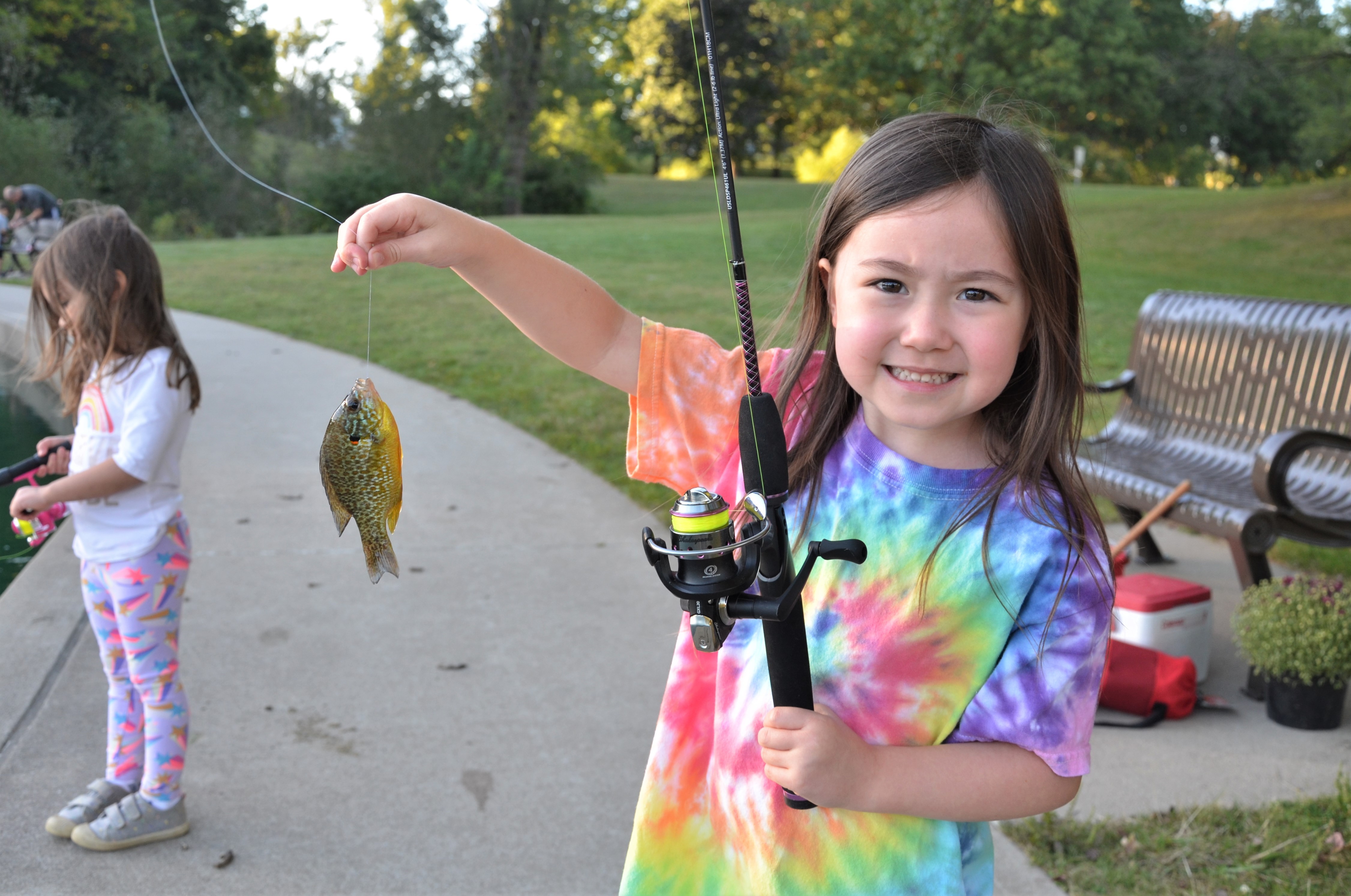 Fishin' mission: Kids learn ins and outs of angling at HBPD's annual 'Fish  with the Force' - Los Angeles Times