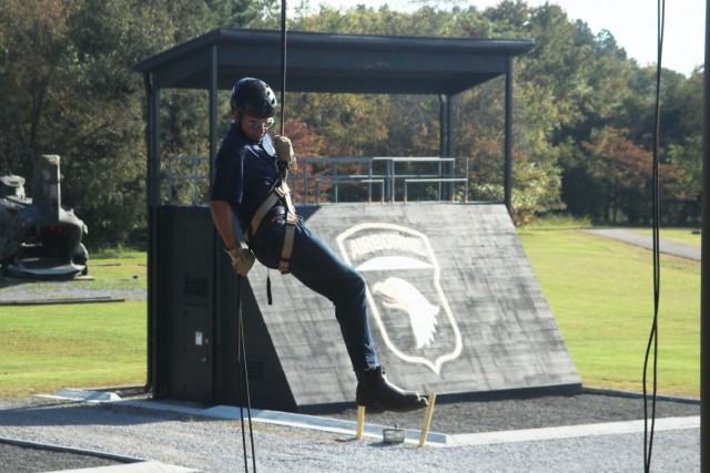 Nick Cunningham, regional consultant, Middle Tennessee Economic Development, Tennessee Valley Authority, rappels down a 34-foot tower at The Sabalauski Air Assault School Sept. 28 while on a Nashville Leaders Tour of Fort Campbell.