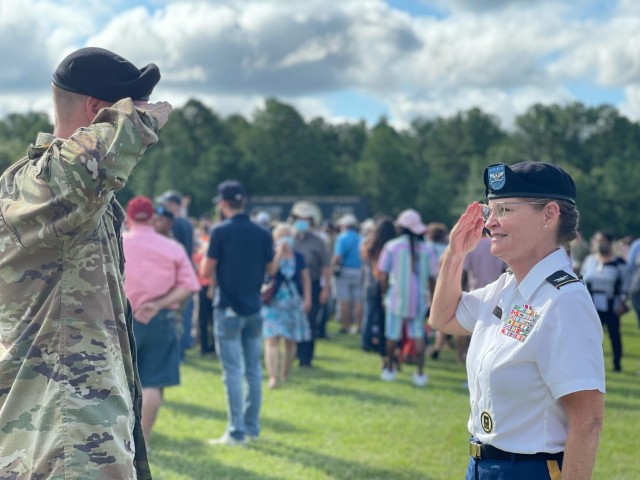 Pfc. Brady Benton, left, renders his first salute to an officer who is also his grandmother, retired Col. Jamie Benton, right, after graduating from Basic Combat training Aug. 12, 2021. Col. Benton is no stranger to Fort Jackson as she graduated basic training in 1983 and has returned four times in the past year to congratulate various Family members who chose military service with the Alabama Army National Guard. (Photo by LaTrice Langston)