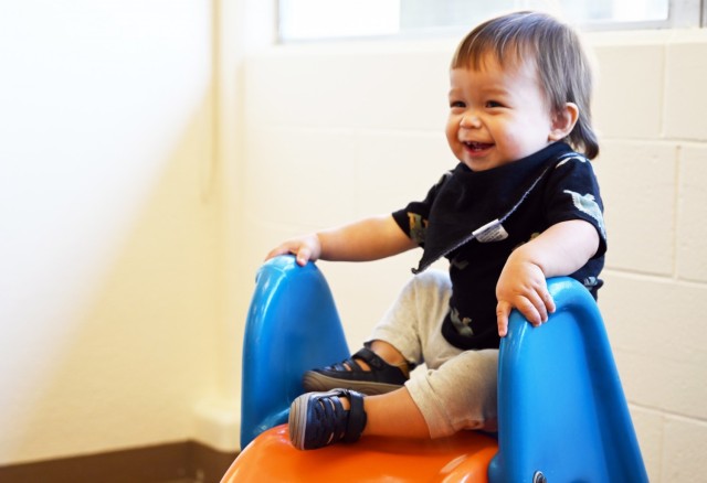 Gideon Hawley, 1, gets ready to go down a slide during the weekly playgroup at Army Community Service, Ord Military Community, Calif., Sept. 28.