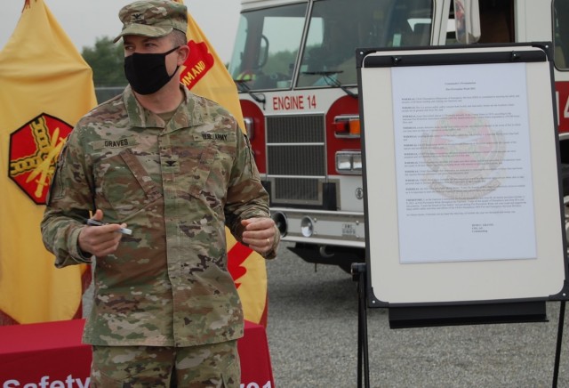 Col. Seth C. Graves, U.S. Army Garrison Humphreys commander, provides comments before signing the 2021 Fire Prevention Week Proclamation, Sept. 30, at the fire department training area. (U.S. Army photo by Steven Hoover)
