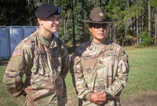 Pvt. Jayden Audette, left, and his drill sergeant Staff Sgt. Paul Cortez, right, both assigned to 3rd Battalion, 34th Infantry Regiment, pose for a photo shortly after they completed the battalion’s Basic Combat Training graduation on Sept. 23,...