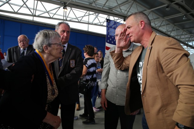 Léonce Descamps being awarded the Order of Saint Michael by Colonel Yastrzemsky on Saturday, September 25, 2021 at Chièvres Air Fest. (US Army Photo by Libby Weiler, USAG Benelux Public Affairs)