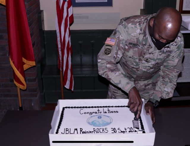 Maj. Gen. Xavier T. Brunson, commander of America’s First Corps, slices the cake for JBLM Rainier ROCKS, the latest chapter of ROCKS, Inc., during the chapter’s chartering ceremony at Joint Base Lewis-McChord, Wash., Sept. 30, 2021....