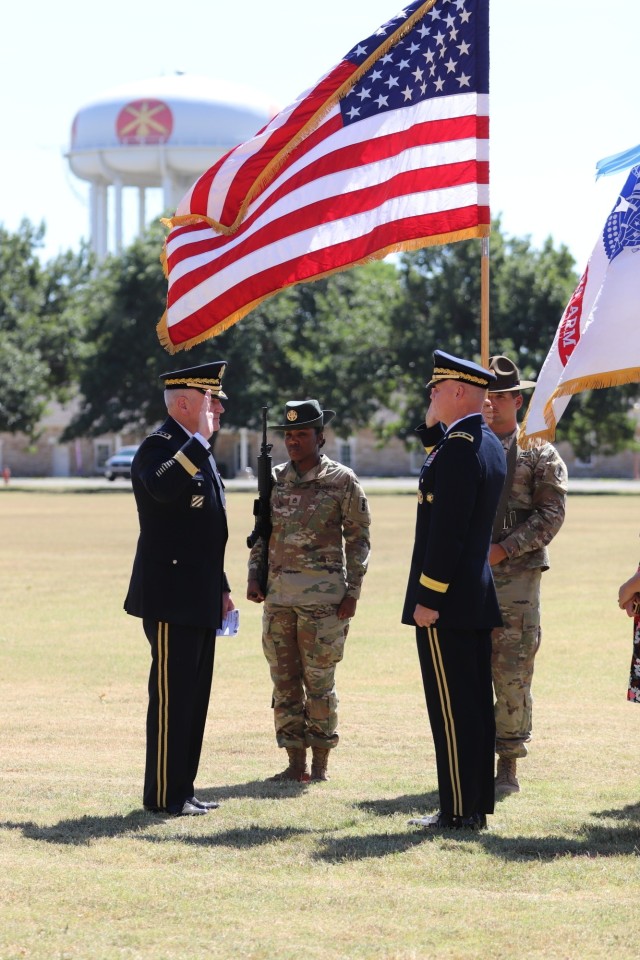 Gen. Michael Murray, commanding general, Army Futures Command and the officiating officer for the ceremony, gives the Oath of Office as Maj. Gen. Brian Gibson receives his second star at Fort Sill, Oklahoma.