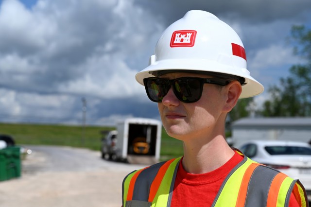 Brittanie Corley, U.S. Army Corps of Engineers, New Orleans District, economist currently deployed to New Orleans, Louisiana, in support of Hurricane Ida recovery efforts, looks at infrastructure during a site inspection in Edgard, Louisiana, Oct....
