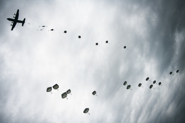 U.S. Army paratroopers assigned to 1st Battalion, 503rd Parachute Infantry Regiment, 173d Airborne Brigade, conduct a joint airborne operation from a C-130 Hercules aircraft alongside paratroopers from the Lithuanian - Polish - Ukrainian Brigade. This training is part of Exercise Rapid Trident 21 at the International Peacekeeping Security Centre near Yavoriv, Ukraine, Sept. 25, 2021.

Rapid Trident 21 involves approximately 6,000 personnel from 15 nations, Sept. 20 - Oct. 1, 2021. Rapid Trident is an annual, multinational exercise that supports joint combined interoperability among the partner militaries of Ukraine and the United States, as well as Partnership for Peace nations and NATO Allies.

The 173d Airborne Brigade is the U.S. Army&#39;s Contingency Response Force in Europe, providing rapidly deployable forces to the United States European, Africa and Central Command areas of responsibility. Forward deployed across Italy and Germany, the brigade routinely trains alongside NATO allies and partners to build partnerships and strengthen the alliance.

