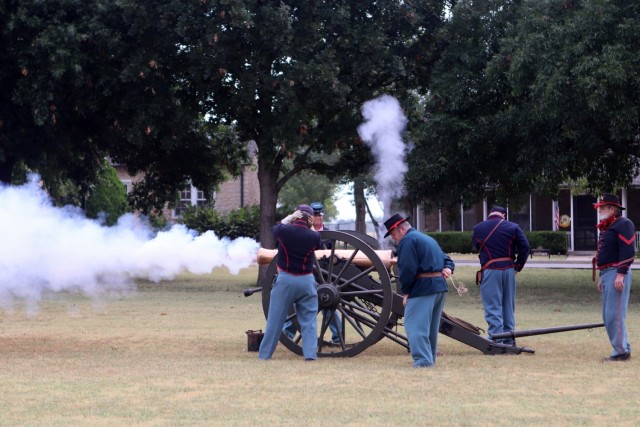 Museum volunteers fire an 1841 6-pounder field gun during Frontier Army Days Oct. 1, 2021, at Fort Sill, Oklahoma. Schoolchildren from area elementary schools toured the demonstrations of frontier living and descriptions of the early days here.