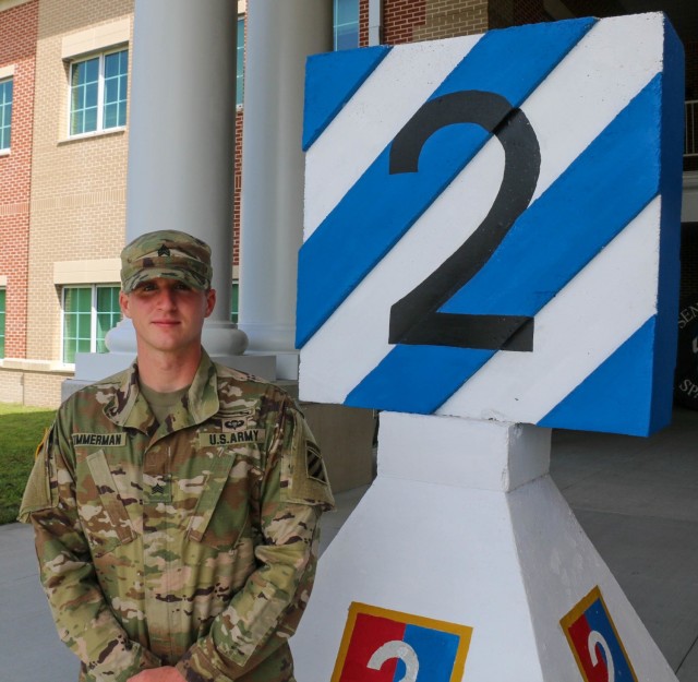 Sgt. Caleb Zimmerman, a recent graduate of Ranger School and the Expert Infantry Badge qualification, assigned to 3rd Battalion, 67th Armor Regiment, "Spartan Brigade," 2nd Armored Brigade Combat Team, 3rd Infantry Division, poses outside his company operations facility at Fort Stewart, Georgia, Sept. 30, 2021. 2nd ABCT, 3rd ID,  is pushing and supporting its most junior leaders to become experts in their craft early to then lead and affect readiness. (U.S. Army photo by Sgt. Justin McClarran)