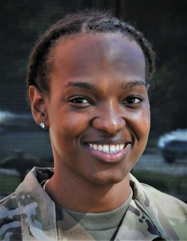 Spc. Takaila Warfield is a Medical Department Activity Soldier who works at the Kenner Army Health Clinic Pharmacy on Fort Lee, Virginia. Military leaders here congratulated her recently for reporting information that led to the apprehension of a man eluding military police after he allegedly stole and crashed a vehicle. (U.S. Army photo by T. Anthony Bell)
