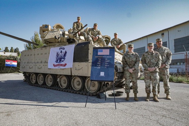 Members of 1st Battalion, 16th Infantry Regiment, 1st Armored Brigade Combat Team, 1st Infantry Division, gather for a photo during the Adriatic Sea Defense and Aerospace exhibition in Split, Croatia, Oct. 1, 2021. ASDA is a high-profile...