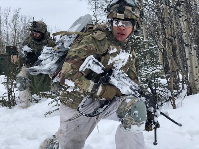 Pvt. Drew Olson, an infantryman assigned to 1st Stryker Brigade Combat Team, 25th Infantry Division, rehearses Stryker dismount techniques with his company during exercise Arctic Edge 2018 near Fort Greely, Alaska. 