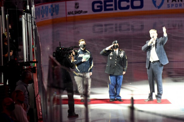 Chicago Blackhawks National Hockey League team honors Sgt. Maj. Dennis Koski, right, 85th U.S. Army Reserve Support Command and U.S. Navy Veteran Lt. j.g. Ash Davis, during a home game at the United Center in Chicago, October 1, 2021. 
...