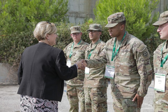Heidi Grant, the director of the Defense Security Cooperation Agency recognizes members of 1st Squadron, 2nd Cavalry Regiment, 7th Army Training Command, for their strategic participation in the Adriatic Sea Defense and Aerospace exhibition in...