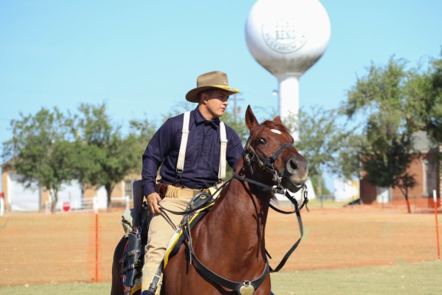 Spc. Bryan Mosqueda, attached to Horse Detachment, Regimental Headquarters and Headquarters Troop, 11th Armored Cavalry Regiment, directs Bradley to trot in a circle at the National Cavalry Competition, Fort Reno, Oklahoma, on September 23, 2021. This movement demonstrates the rider’s control and knowledge of their mount.