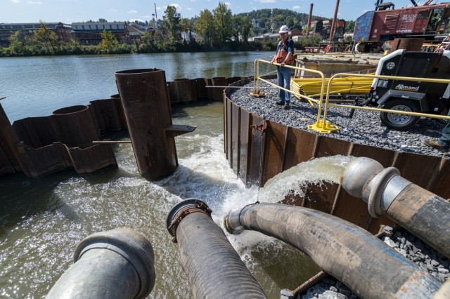 Contractors pump water out of the newly-constructed lock chamber at Charleroi Locks and Dam on the lower Monongahela River in Pennsylvania, Sept. 30, 2021. The U.S. Army Corps of Engineers Pittsburgh District recently finished building the new...