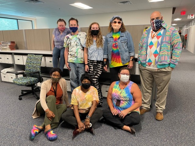 Member of the U.S. Army Corps of Engineers Contracting team show off their Tie Dye during Contracting's "Spirit Week," a morale boosting event held in the lead up to a new fiscal year. The weeks leading up to the end of a fiscal year can be...