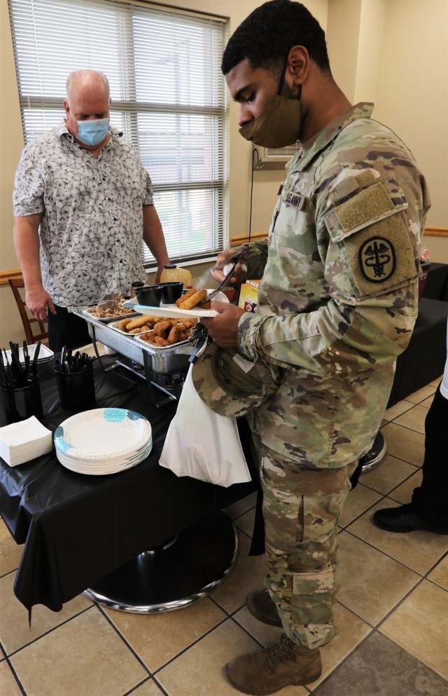 Spc. Antonio Vazquez tries a variety of healthier meal options during a menu tasting event Oct. 5, 2021.